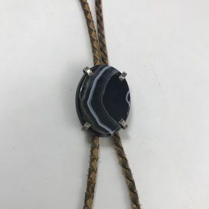 Vintage bolo tie with leather and black pendant